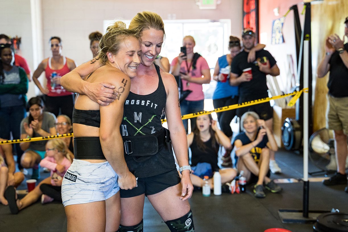 Members participating in a coach-led group fitness class